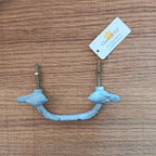 Antique gray furniture handle with flowers and birds