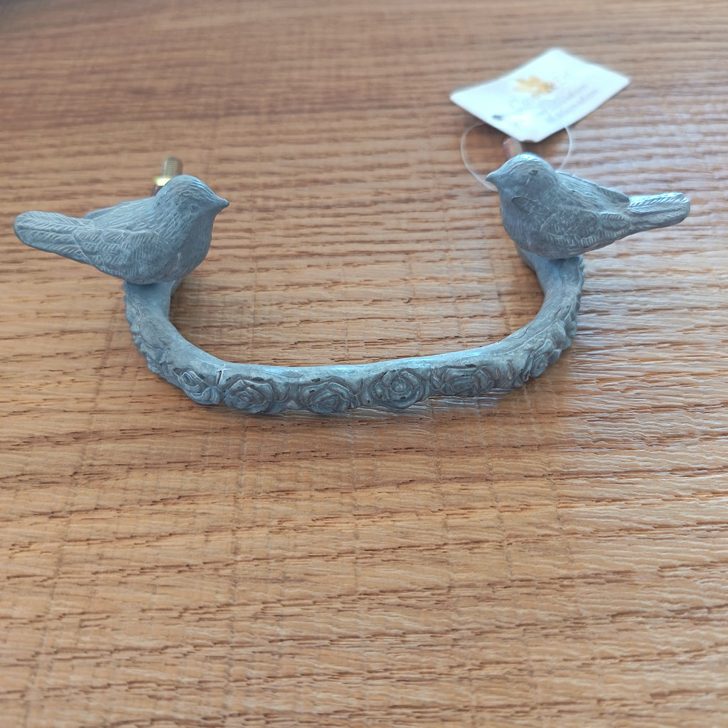 Antique gray furniture handle with flowers and birds