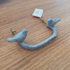 Antique gray furniture handle with flowers and birds